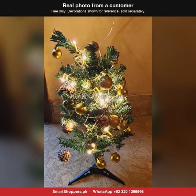 2 ft green Christmas tree with gold balls, pine cones and warm fairy lights