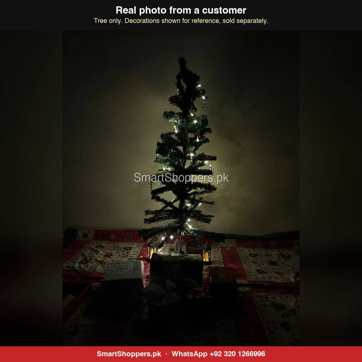 Real customer photo of a 4 ft green artificial Christmas tree bought from SmartShoppers.pk