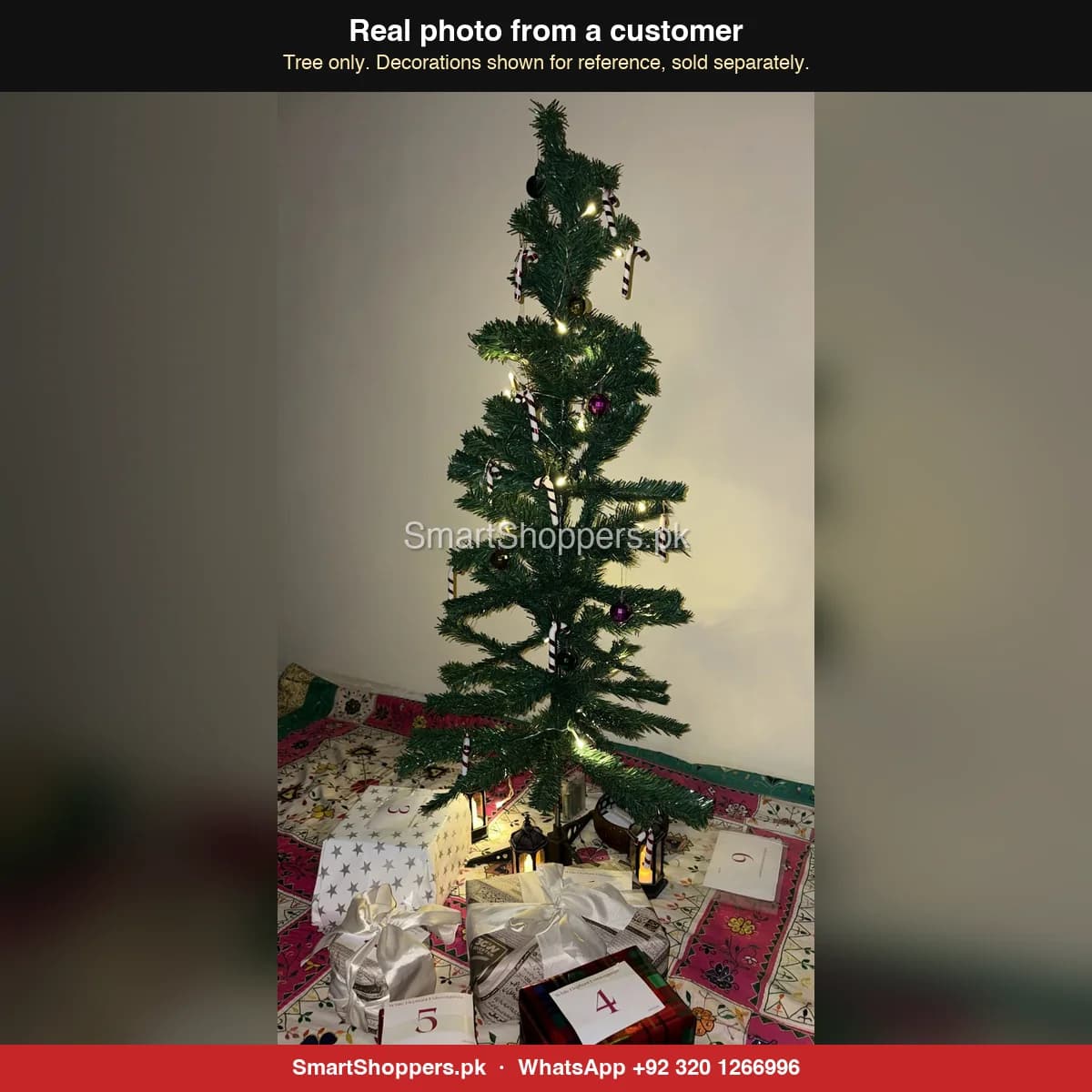 Real customer photo of a 4 ft green artificial Christmas tree bought from SmartShoppers.pk