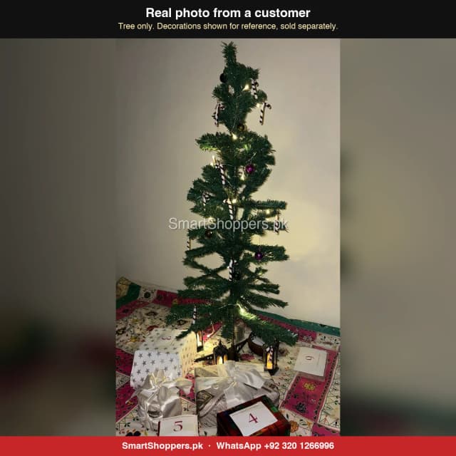 4 ft green Christmas tree with candy canes, lights and numbered gift boxes