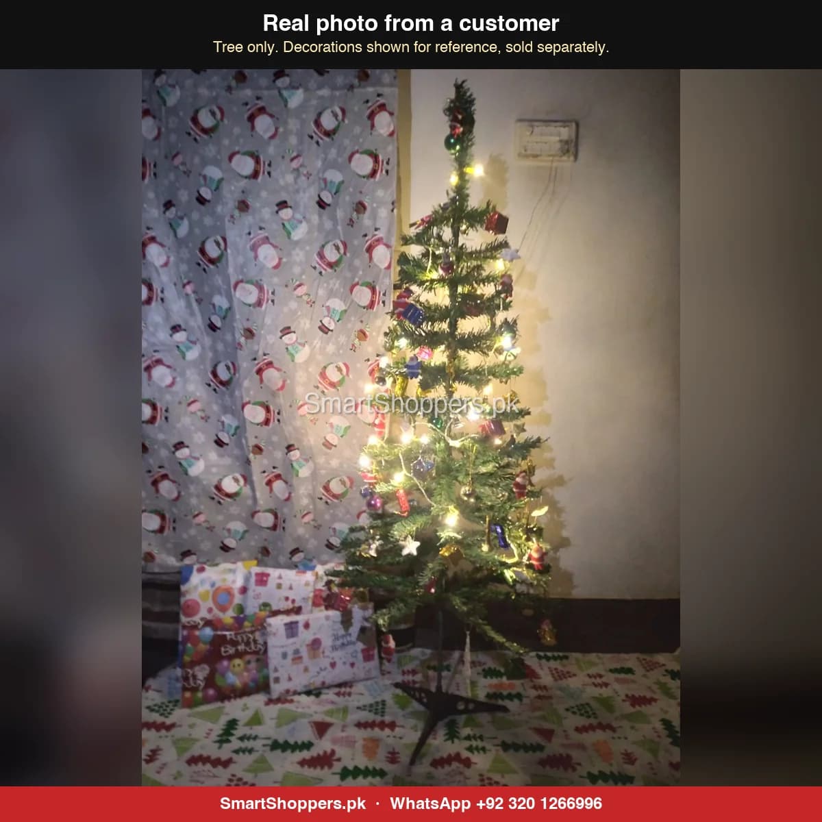 Real customer photo of a 4 ft green artificial Christmas tree bought from SmartShoppers.pk