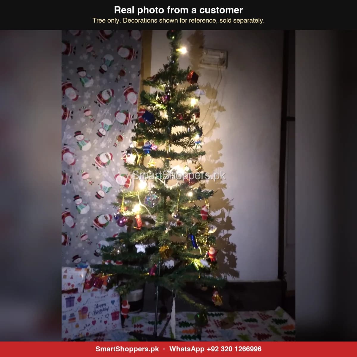 Real customer photo of a 4 ft green artificial Christmas tree bought from SmartShoppers.pk
