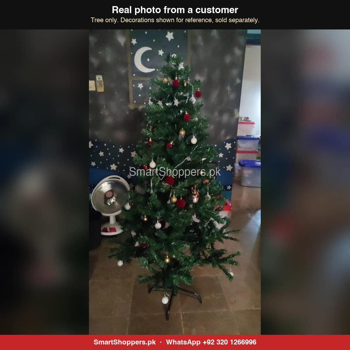 Real customer photo of a 5 ft green artificial Christmas tree bought from SmartShoppers.pk