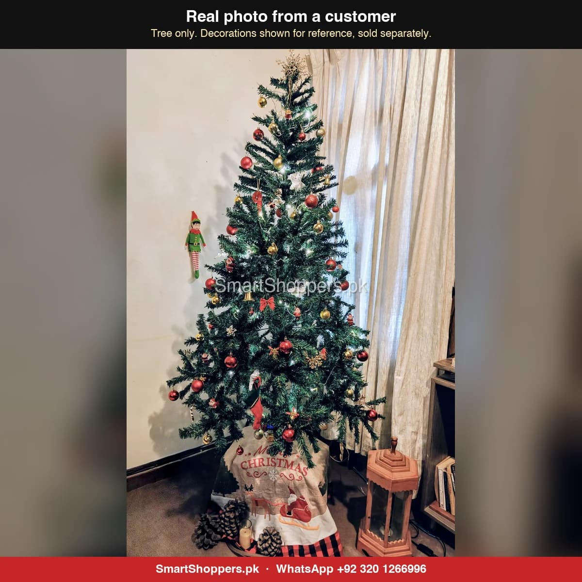 Real customer photo of a 6 ft green artificial Christmas tree bought from SmartShoppers.pk