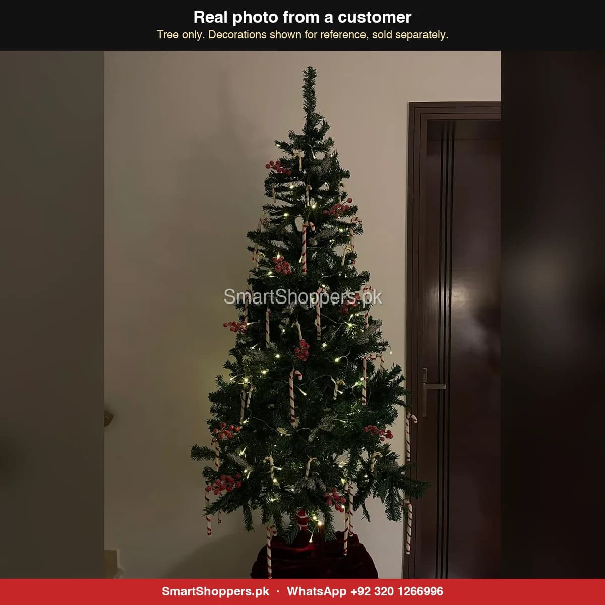 Real customer photo of a 6 ft green artificial Christmas tree bought from SmartShoppers.pk