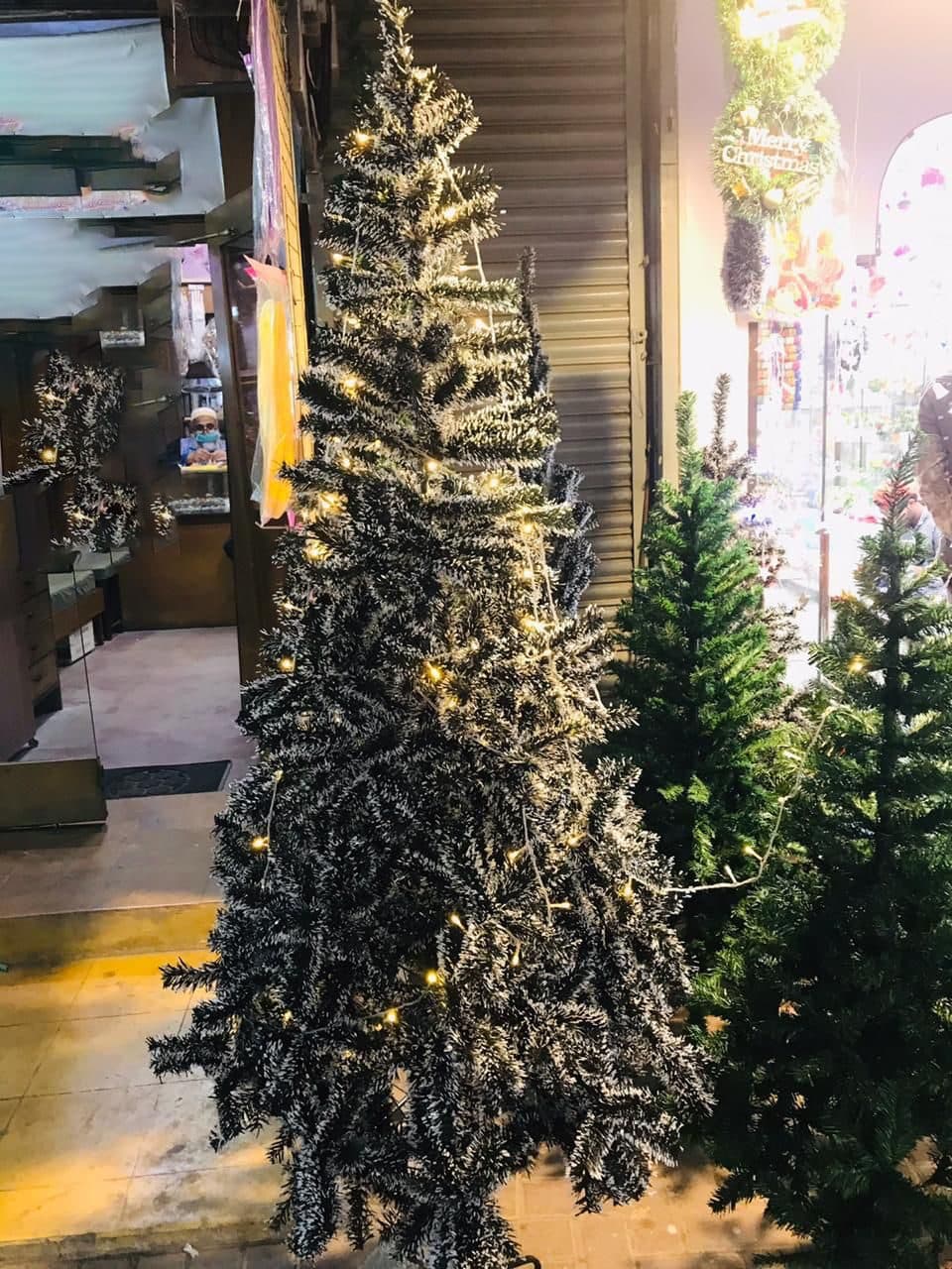 7 ft green artificial Christmas tree