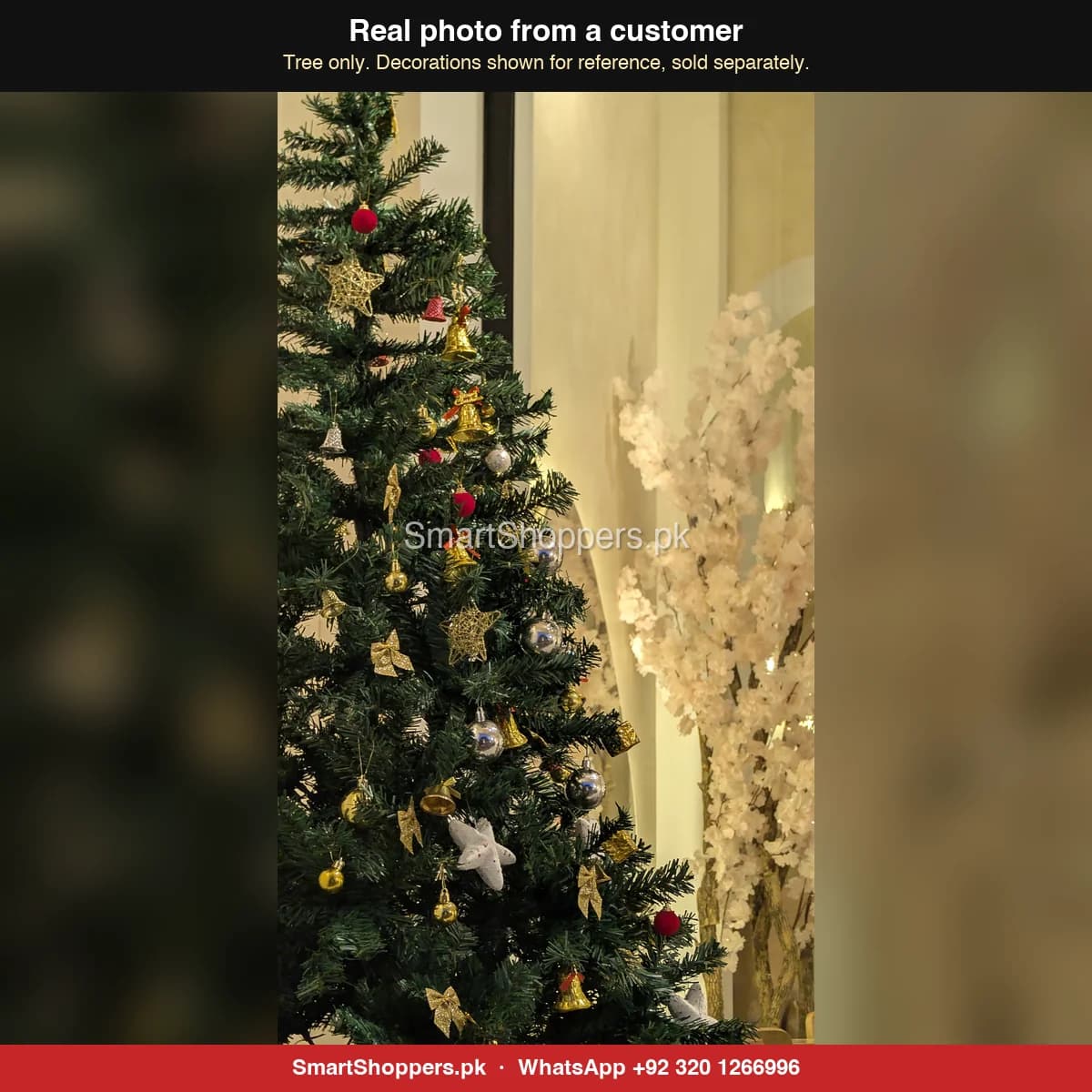 Real customer photo of a 7 ft green artificial Christmas tree bought from SmartShoppers.pk