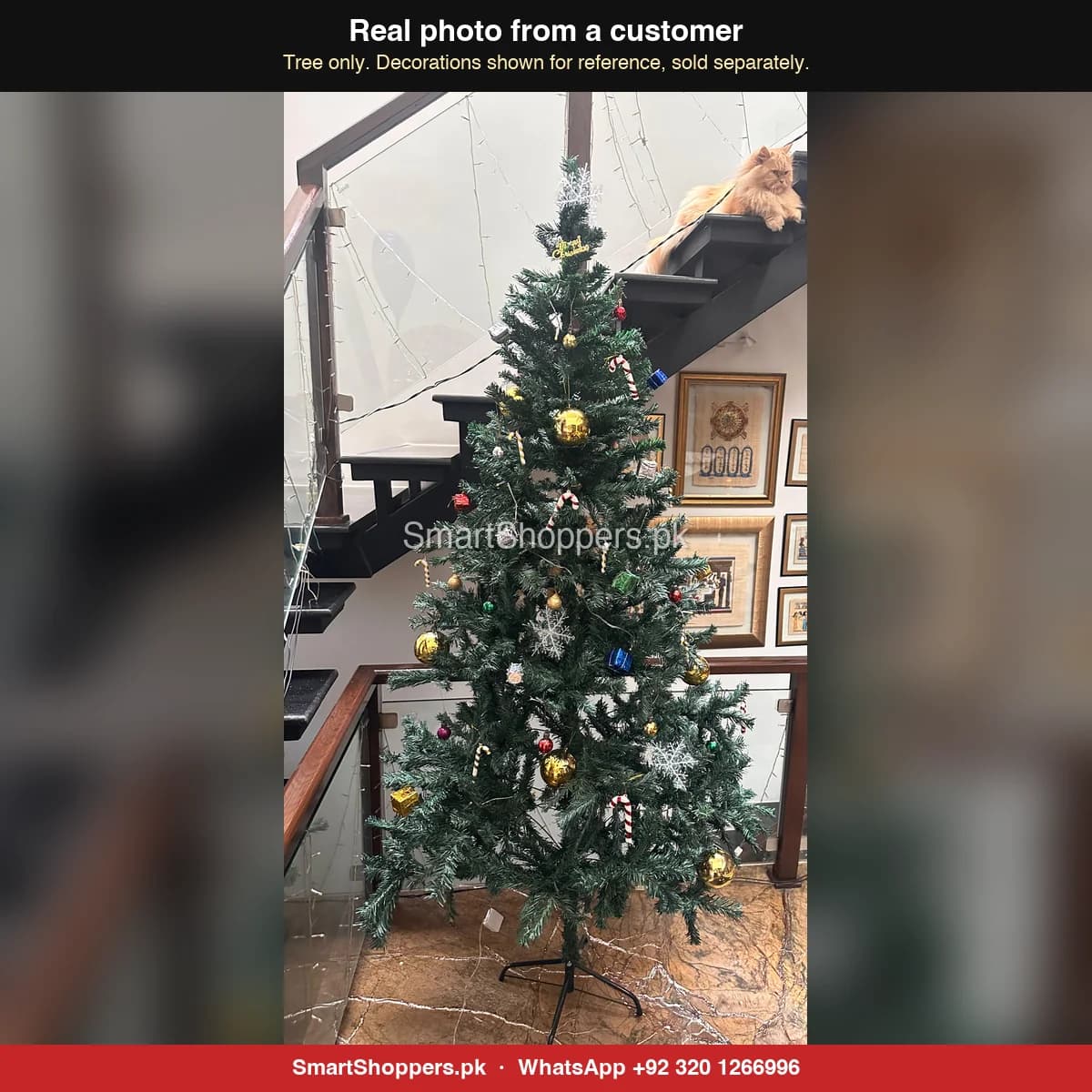 Real customer photo of a 7 ft green artificial Christmas tree bought from SmartShoppers.pk