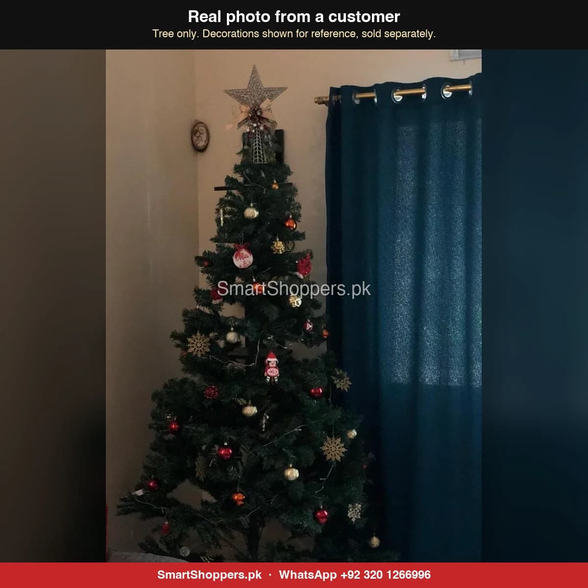 Real customer photo of a 7 ft green artificial Christmas tree bought from SmartShoppers.pk