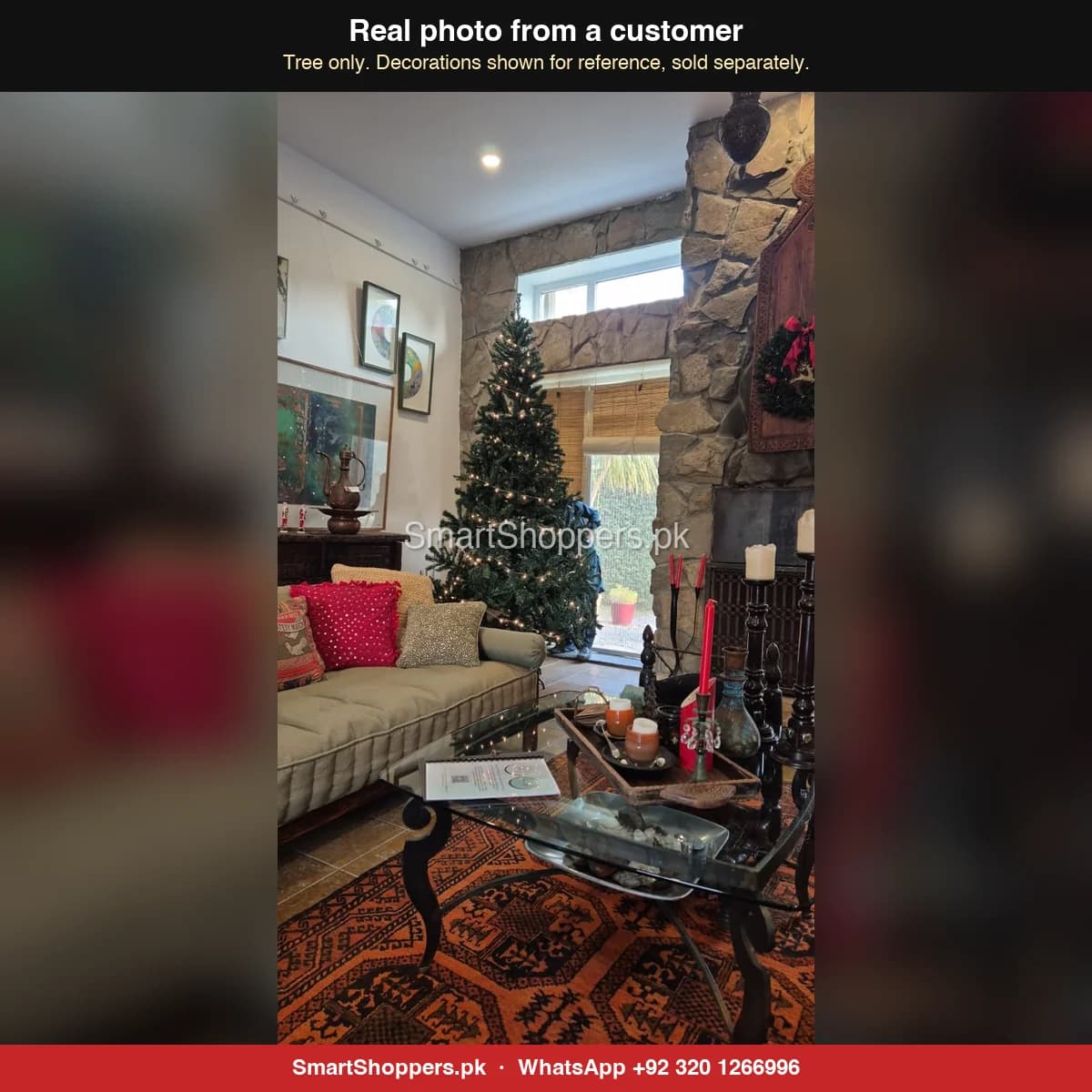 Real customer photo of a 9 ft green artificial Christmas tree bought from SmartShoppers.pk