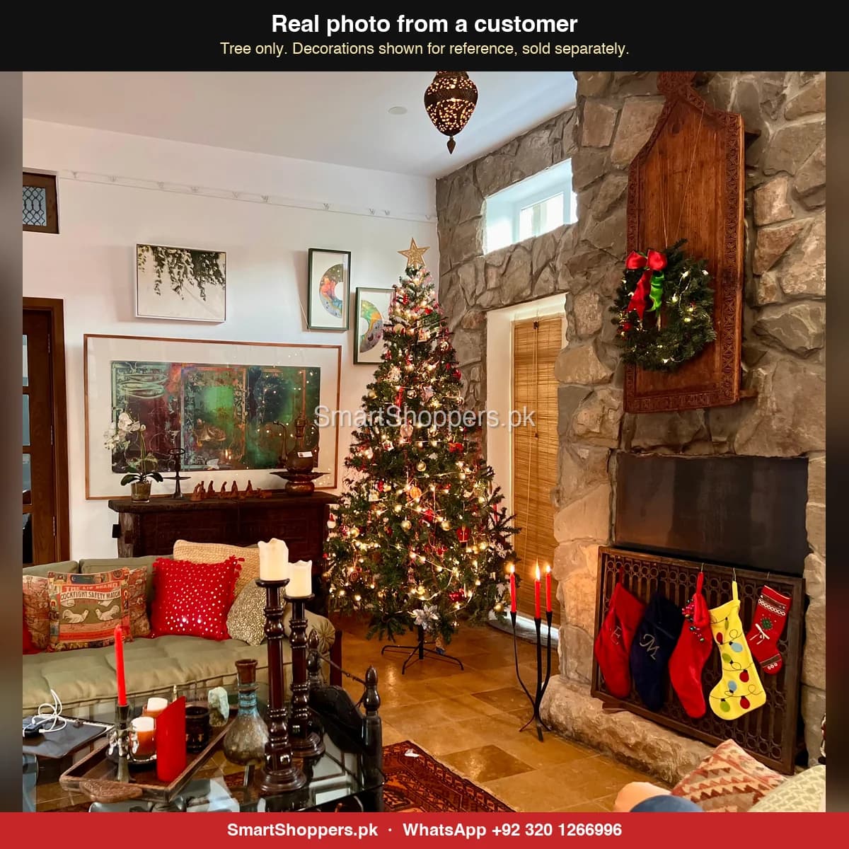 Real customer photo of a 9 ft green artificial Christmas tree bought from SmartShoppers.pk