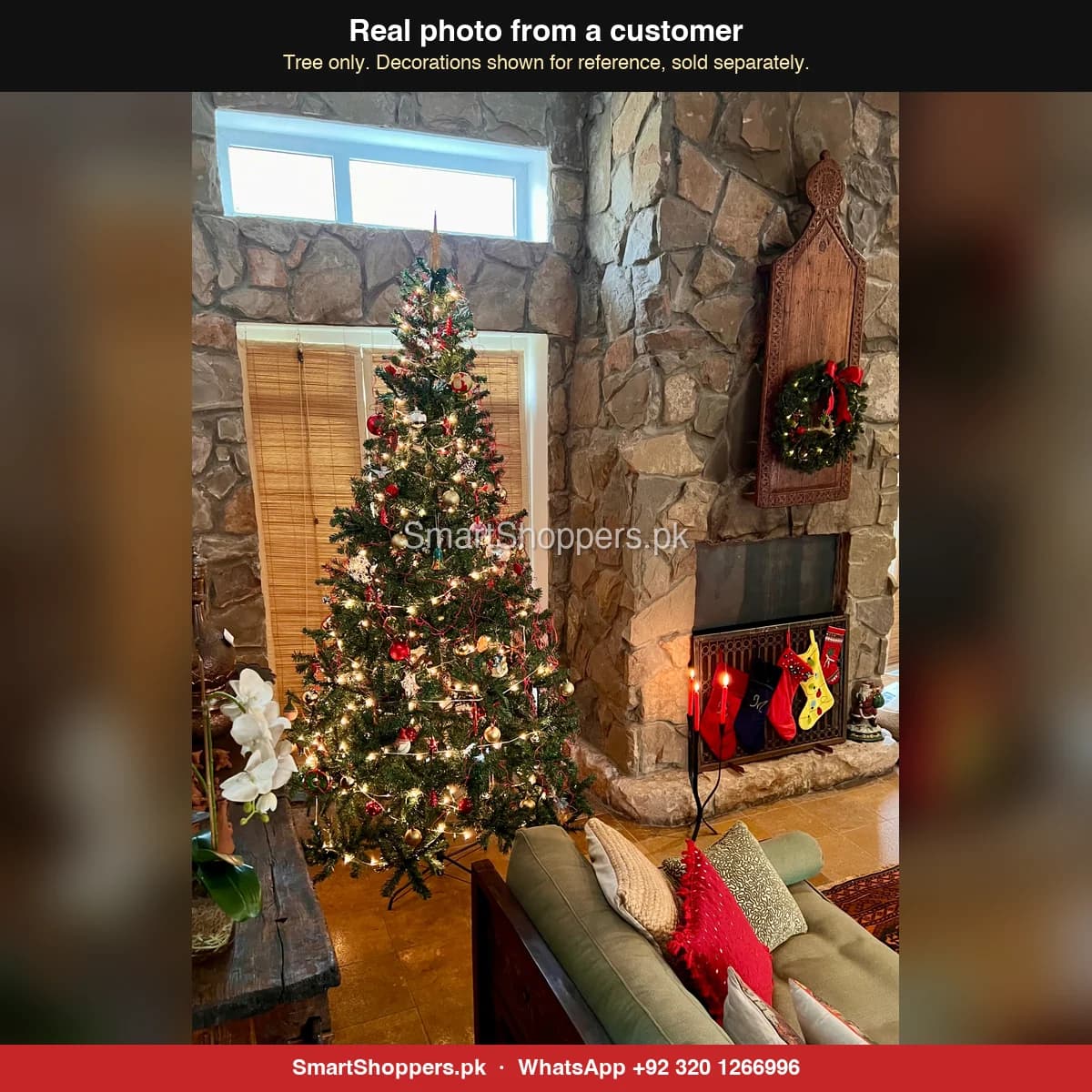 Real customer photo of a 9 ft green artificial Christmas tree bought from SmartShoppers.pk