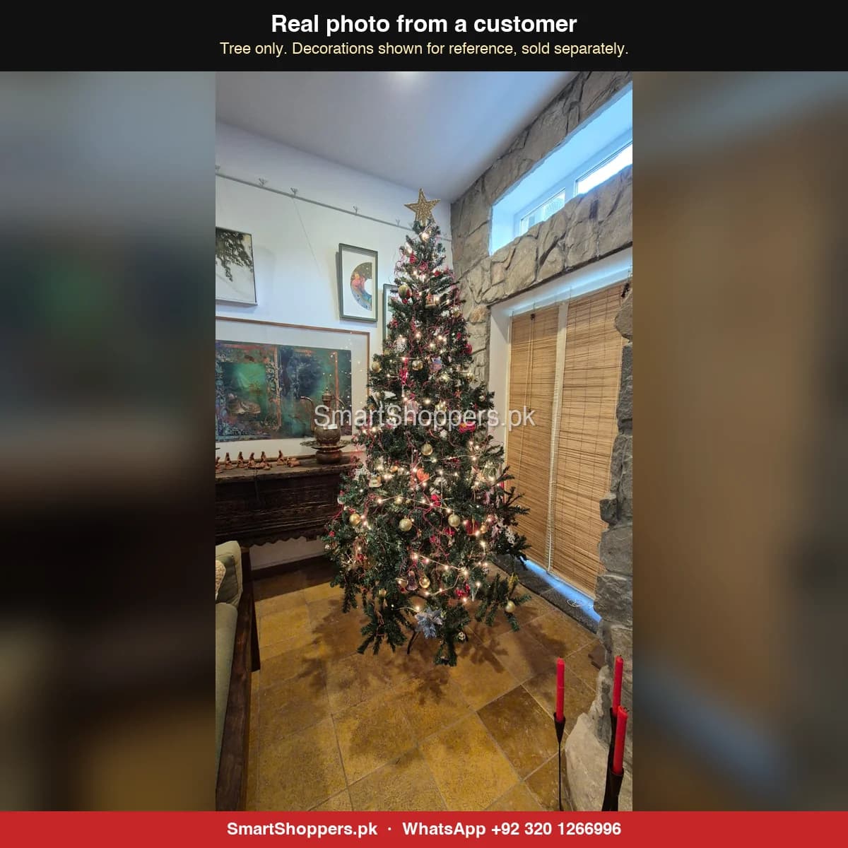 Real customer photo of a 9 ft green artificial Christmas tree bought from SmartShoppers.pk