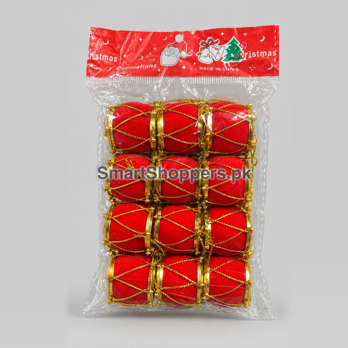Pack of 12 red drum ornaments with gold rims and gold cords, in their bag