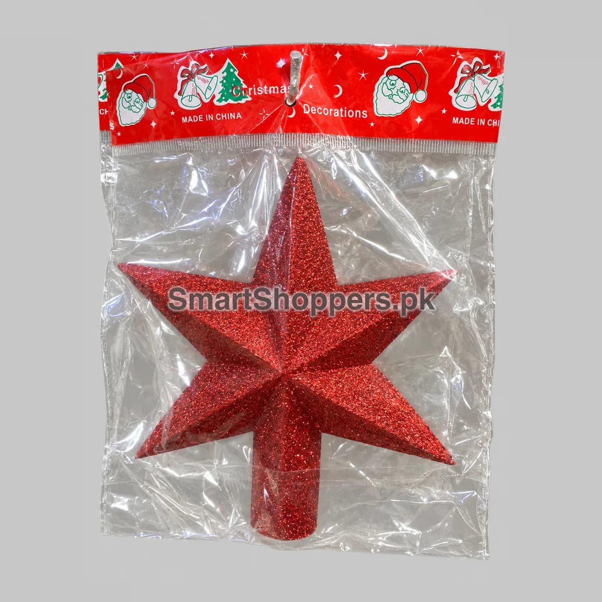 Red glitter 3D star tree topper for Christmas tree, in its pack
