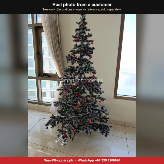 6 ft Snow Green Christmas tree in a bright room by the window