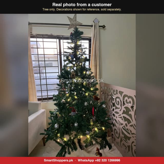 7 ft green Christmas tree with warm fairy lights in a customer's living room