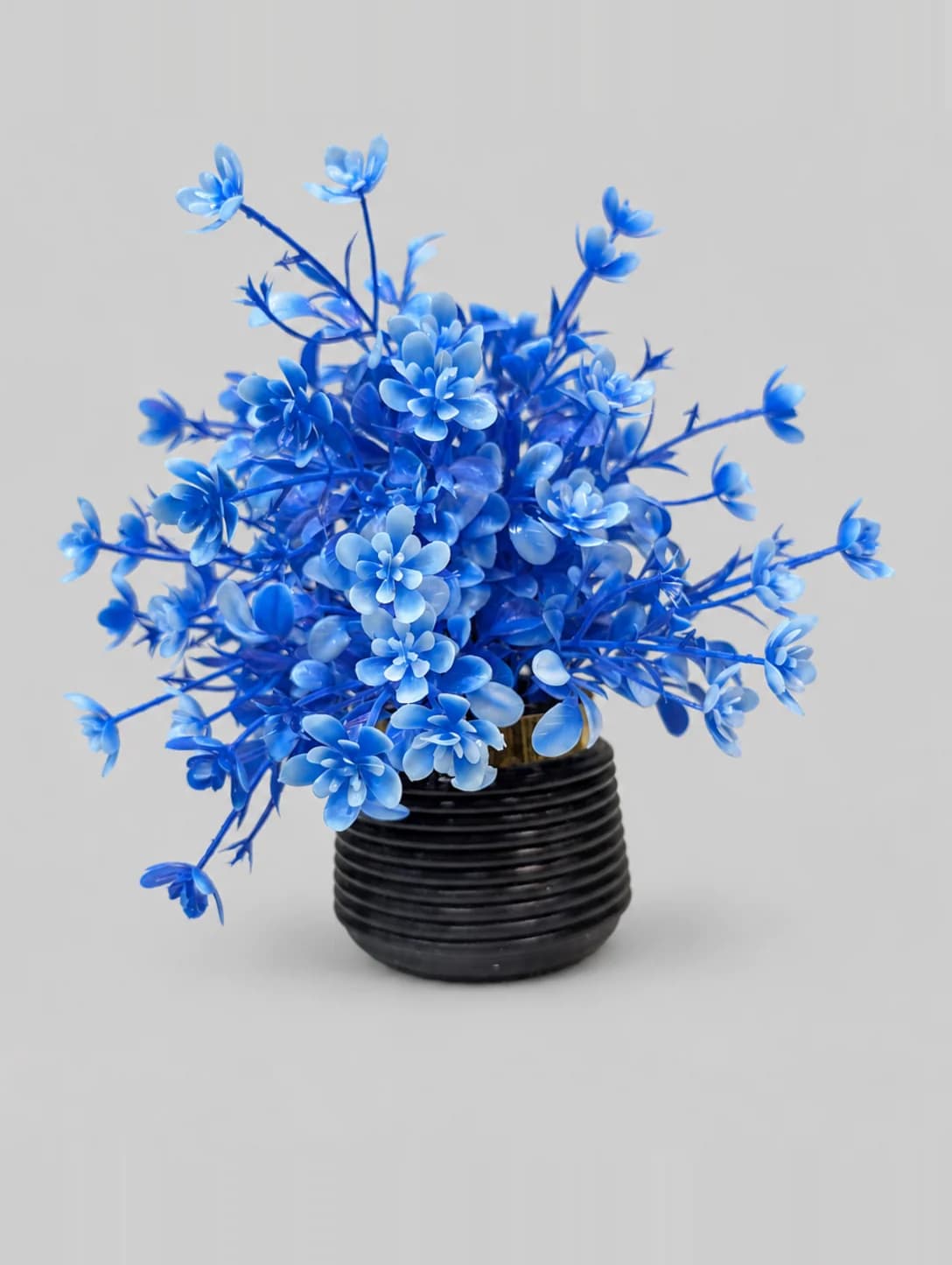 Artificial Blue Flower Plant in Black Ribbed Pot