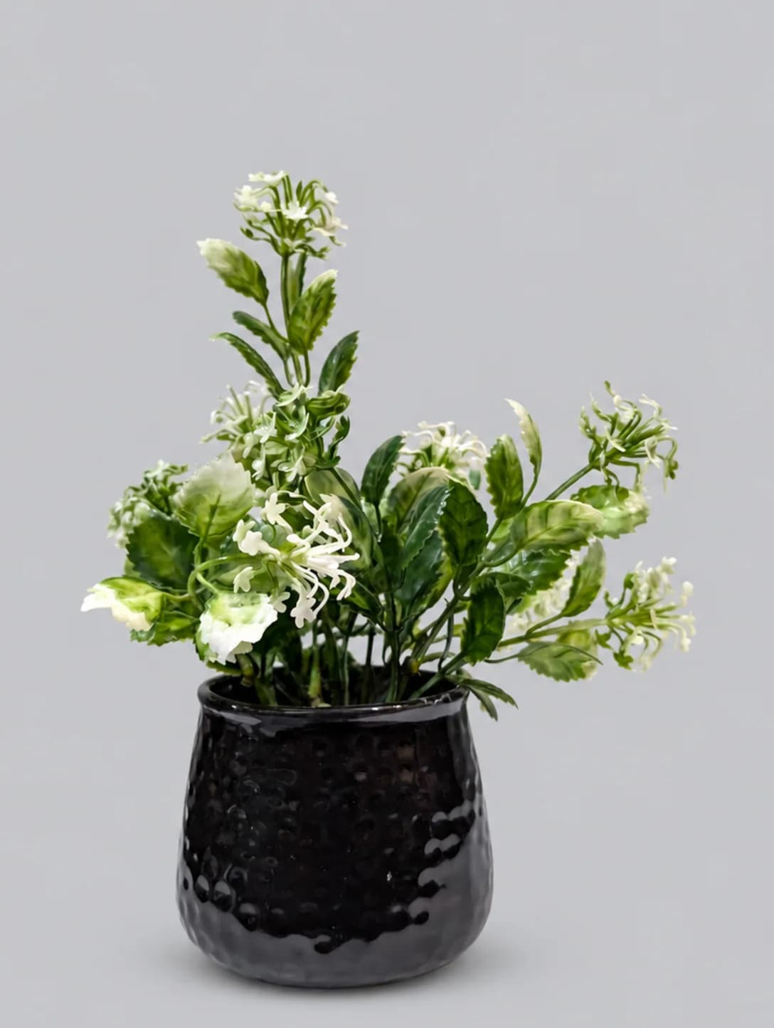 Artificial Green and White Flower Plant in Black Glossy Hammered Pot