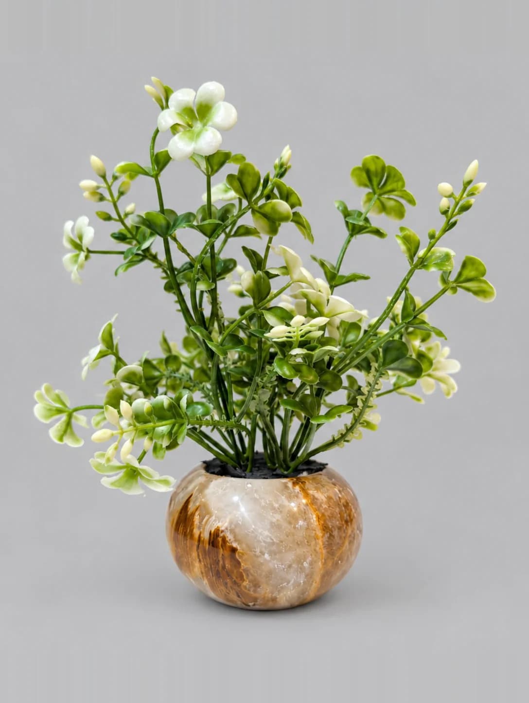 Artificial Green and White Leafy Plant in Brown Marble-Look Round Pot