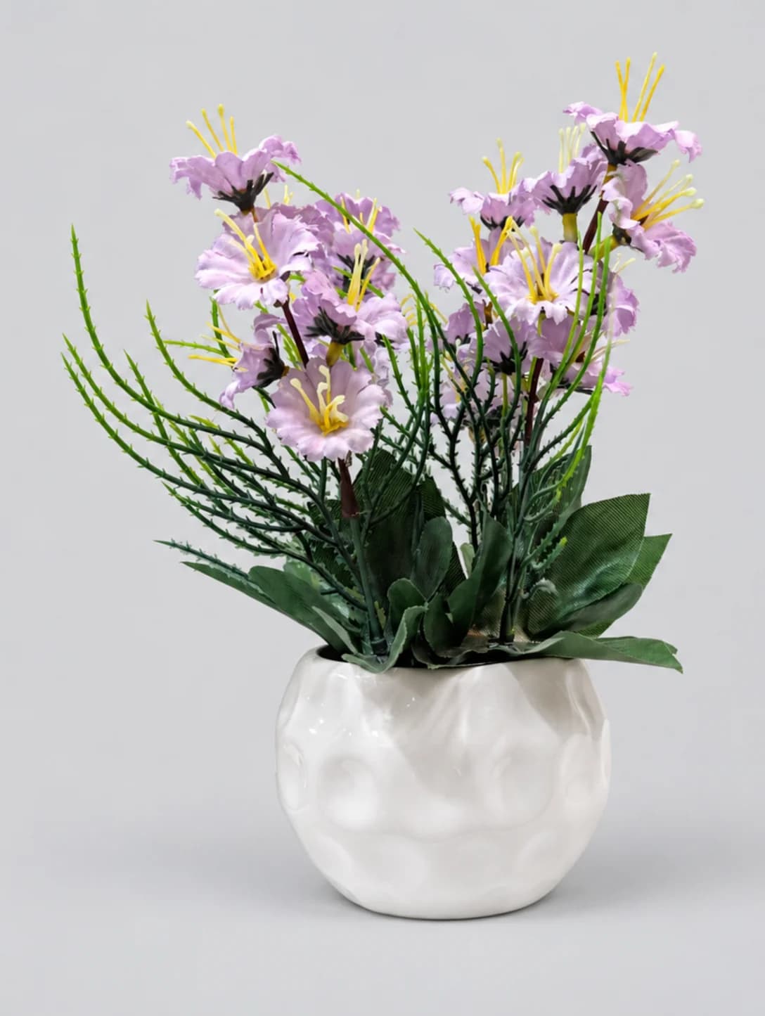 Artificial Light Purple Frilly Flower Arrangement in White Wavy Round Pot