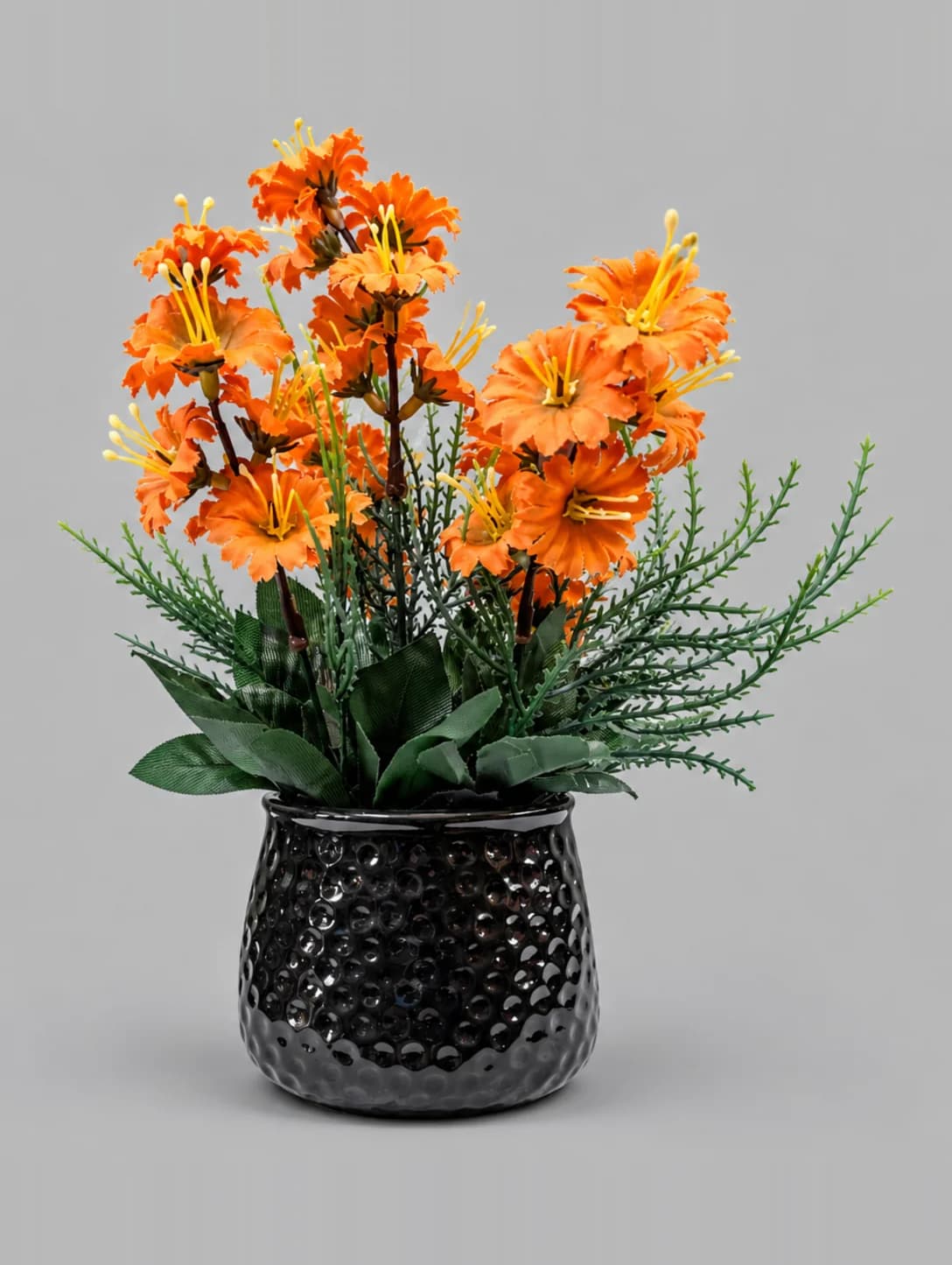 Artificial Orange Lily-Style Flower Arrangement in Black Glossy Dimpled Pot