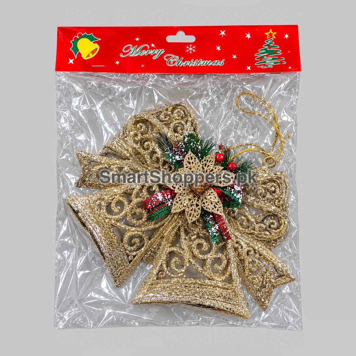 Large glitter bell ornament with holly and red berries in its pack