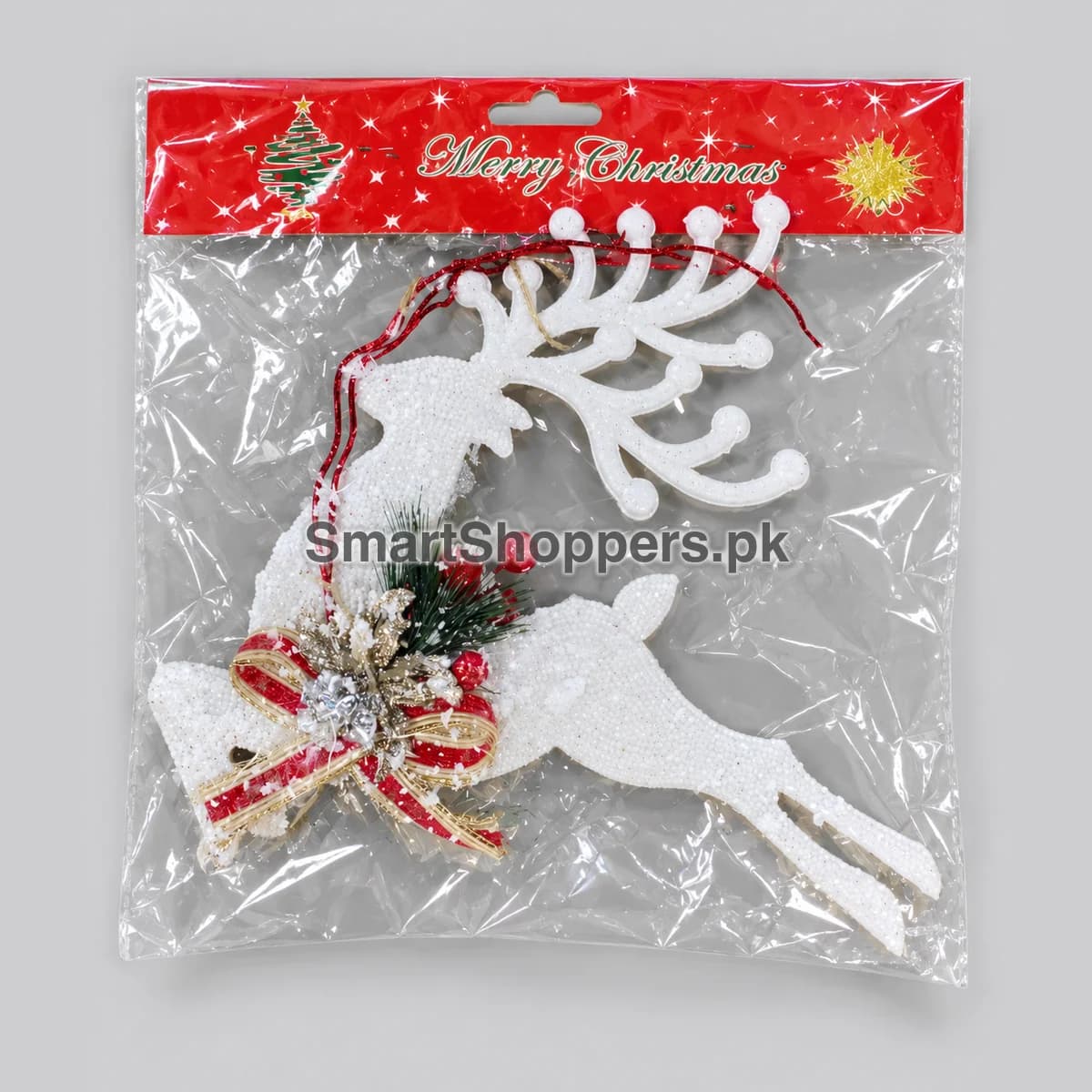 Large white glitter reindeer ornament with red berries and a red and white bow