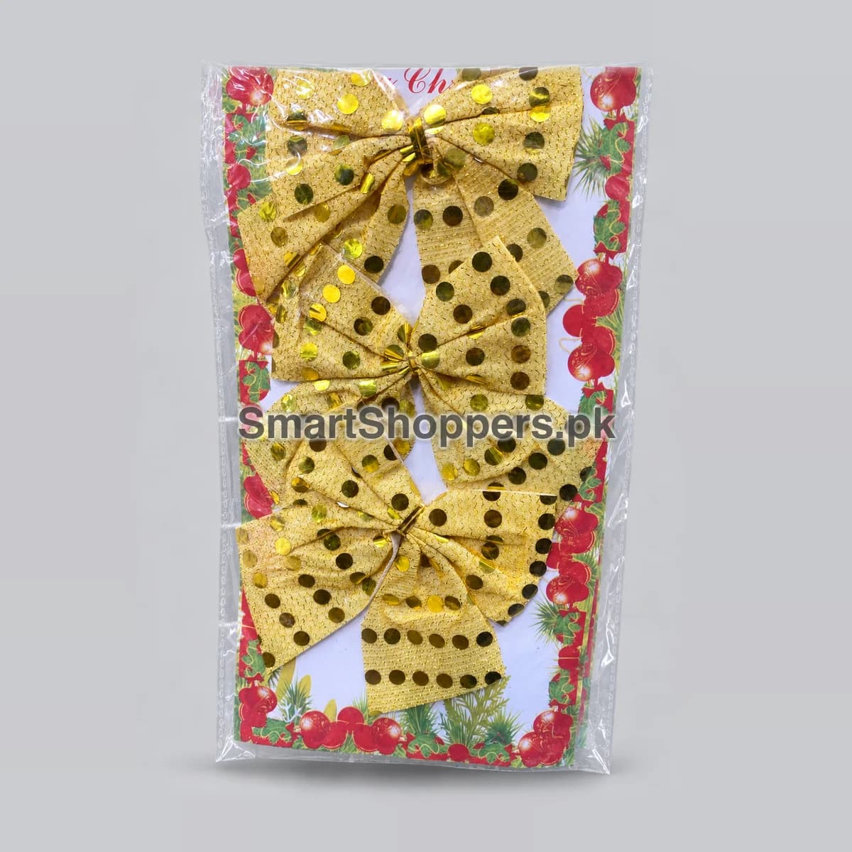 Pack of 3 gold sequin bows for Christmas tree decoration, on a card in their bag