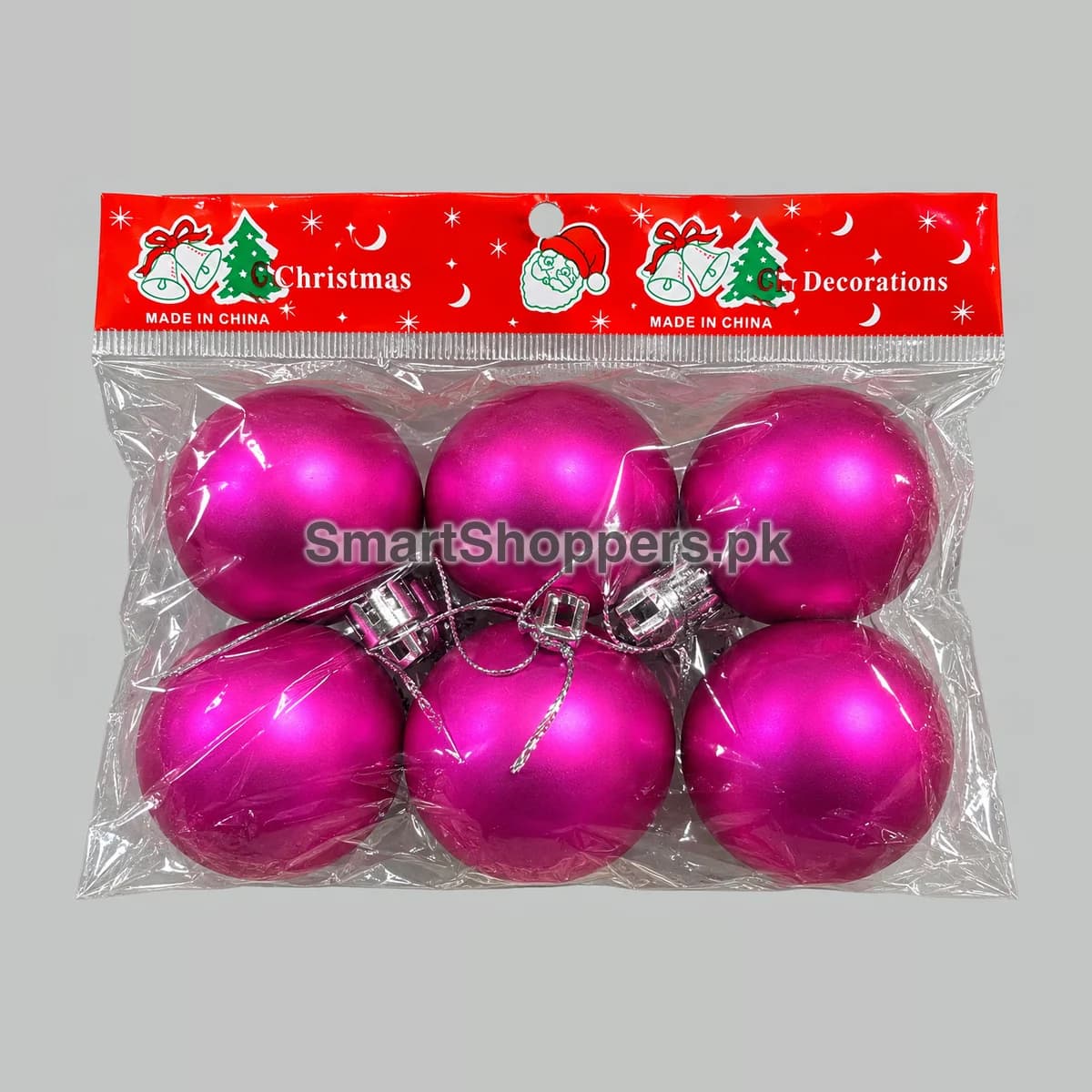 Pack of 6 deep pink matte Christmas balls with silver caps and cords, in their bag
